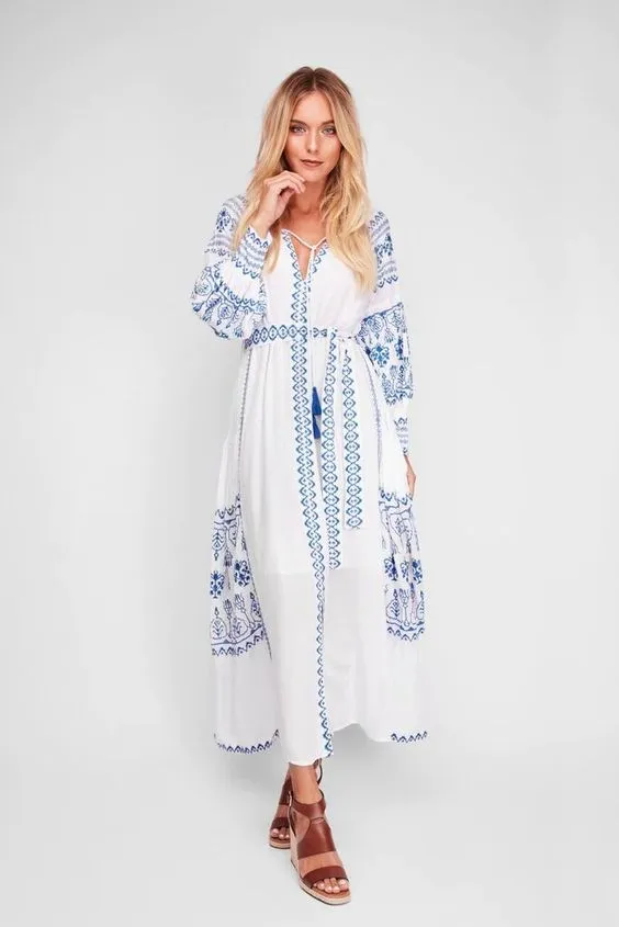 Bahia Maxi Dress White With Blue Embroidery Long Puffed Peasant Sleeves Embroidered Pockets Bohemian Tassel Ties Available In Small Medium Large Or XL