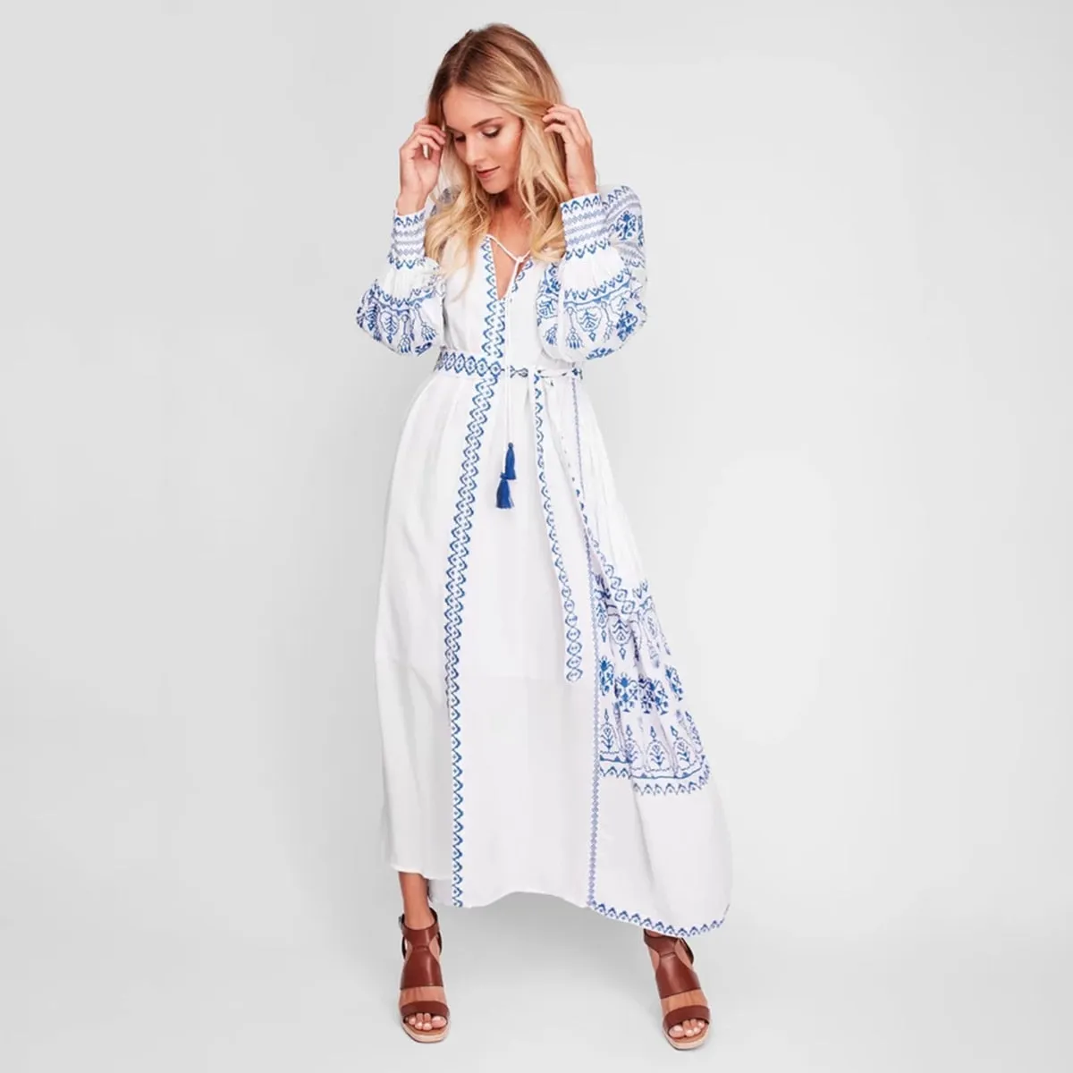 Bahia Maxi Dress White With Blue Embroidery Long Puffed Peasant Sleeves Embroidered Pockets Bohemian Tassel Ties Available In Small Medium Large Or XL