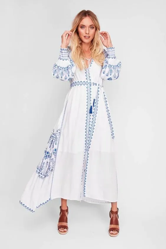 Bahia Maxi Dress White With Blue Embroidery Long Puffed Peasant Sleeves Embroidered Pockets Bohemian Tassel Ties Available In Small Medium Large Or XL